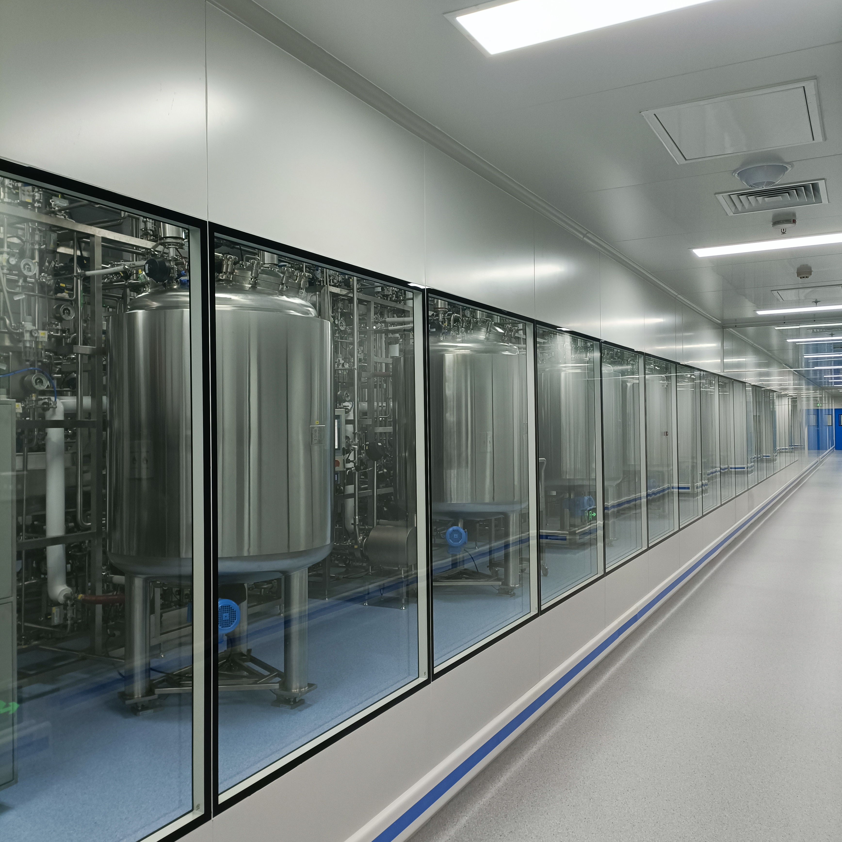Pharmaceutical manufacturing equipment inside a production facility