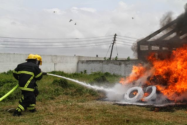 Ghana National Fire Service firefighters during an emergency response.